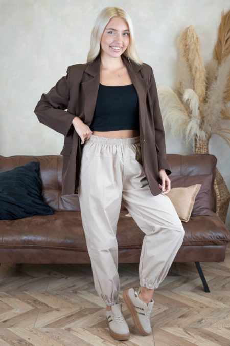 Spodnie materiałowe szerokie ze ściagaczami Beżowy – Flowenne 1