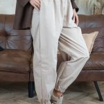 Spodnie materiałowe szerokie ze ściagaczami Beżowy – Flowenne 3