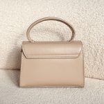 Torebka z rączką oraz podłużną owalną klamrą Beżowy – Oval Touch 2